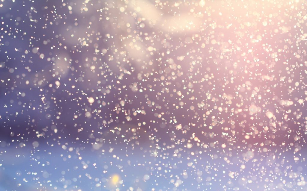 An image of snow falling on a blue and pink background